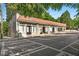 Commercial building with a red-tile roof, awning windows, and sidewalk at 863 Commonwealth Se Ave, Atlanta, GA 30312