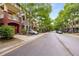 Charming street view showcasing well-maintained townhomes with beautiful architectural details and tree-lined streets at 863 Commonwealth Se Ave, Atlanta, GA 30312