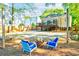 Outdoor patio with fire pit and cozy seating, enhanced by string lights and lush greenery at 1426 Memorial Se Dr, Atlanta, GA 30317