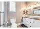 Modern bathroom with dual vessel sinks and a walk-in shower at 1426 Memorial Se Dr, Atlanta, GA 30317