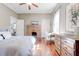 Cozy bedroom featuring a brick fireplace and bright window at 1426 Memorial Se Dr, Atlanta, GA 30317