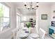 Dining area with ample natural light and kitchen views at 1426 Memorial Se Dr, Atlanta, GA 30317
