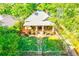 Charming home with a manicured lawn, a welcoming front porch, and beautiful landscaping at 1426 Memorial Se Dr, Atlanta, GA 30317