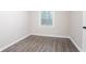 Cozy bedroom showcasing hardwood floors and a sunlit window, perfect for relaxation at 2046 Copperfield Cir, Decatur, GA 30035