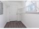 Walk-in closet featuring wood-look flooring and shelving at 2046 Copperfield Cir, Decatur, GA 30035