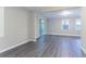 Living room featuring hardwood flooring and a sliding glass door to the backyard at 2046 Copperfield Cir, Decatur, GA 30035