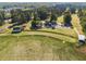 Aerial view of golf course, showing the fairway, surrounding trees, and clubhouse at 2316 Echelon Ln, Smyrna, GA 30080