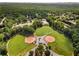 Aerial view of community ball fields and tennis courts surrounded by lush green trees in a quiet residential area at 2316 Echelon Ln, Smyrna, GA 30080