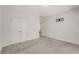 This bedroom has carpeted floors, neutral paint and baseboards, and a double door closet at 2316 Echelon Ln, Smyrna, GA 30080