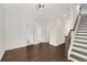 Entryway with hardwood floors and staircase leading to the upper level at 2316 Echelon Ln, Smyrna, GA 30080