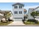 Beautiful two-story home featuring a well-manicured lawn, gray siding, and a two-car garage at 2316 Echelon Ln, Smyrna, GA 30080