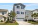 Charming two-story home with gray siding, well-manicured lawn, and a two-car garage, perfect for families at 2316 Echelon Ln, Smyrna, GA 30080