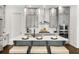 Modern kitchen with a spacious island, stainless steel appliances, and sophisticated gray cabinets at 2316 Echelon Ln, Smyrna, GA 30080