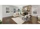 Inviting living room with brick fireplace, large windows, and modern furnishings, creating a comfortable space at 2316 Echelon Ln, Smyrna, GA 30080