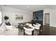 Comfortable living room featuring modern decor, bar area, and hardwood floors, perfect for relaxation and entertaining at 2316 Echelon Ln, Smyrna, GA 30080