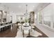 Open concept kitchen, dining, and living area with abundant natural light at 2316 Echelon Ln, Smyrna, GA 30080