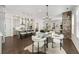Open concept living space with modern kitchen, dining and living areas and hardwood floors at 2316 Echelon Ln, Smyrna, GA 30080