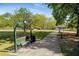Enjoy a relaxing swing bench along a paved walking path in a Smyrna park at 2316 Echelon Ln, Smyrna, GA 30080