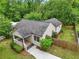 The house is perfectly situated on a large lot and boasts mature trees and manicured landscaping at 2864 White Oak Dr, Decatur, GA 30032