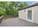 Spacious back deck offering a perfect outdoor space for relaxing or entertaining with views of lush greenery at 2864 White Oak Dr, Decatur, GA 30032