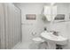 Bathroom featuring white tile floor, toilet and shower with shower curtain at 2864 White Oak Dr, Decatur, GA 30032
