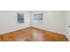 Well-lit bedroom with hardwood floors and large windows, offering a bright and airy atmosphere at 2864 White Oak Dr, Decatur, GA 30032
