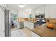 Updated kitchen features stainless steel appliances, beautiful countertops and white cabinetry at 2864 White Oak Dr, Decatur, GA 30032