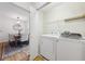 Conveniently located laundry room with washer, dryer, and easy access to the dining room at 2864 White Oak Dr, Decatur, GA 30032