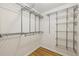 Spacious walk-in closet featuring custom metal shelving and hardwood floors, perfect for organization and style at 2864 White Oak Dr, Decatur, GA 30032