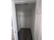 Small closet with a shelf and carpeted floor at 3789 Waldrop Ln, Decatur, GA 30034