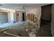 Damaged living room featuring neutral walls, carpeting, and a ceiling fan at 3789 Waldrop Ln, Decatur, GA 30034