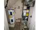 Utility closet containing a water heater and HVAC system at 3789 Waldrop Ln, Decatur, GA 30034