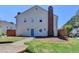 Charming two-story townhome with a well-maintained lawn and inviting curb appeal at 5554 Clover Rise Ln, Norcross, GA 30093