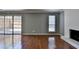 Bright living room with a decorative fireplace and access to the outdoor area at 5554 Clover Rise Ln, Norcross, GA 30093