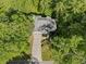 Aerial view of a home nestled among lush green trees, showcasing its serene and private setting at 1169 Dawn View Nw Ln, Atlanta, GA 30327