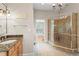 Bright bathroom with a walk-in shower, granite countertops, and modern fixtures at 1169 Dawn View Nw Ln, Atlanta, GA 30327