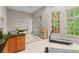Large bonus room with tread mill, air hockey and walkout to covered porch at 1169 Dawn View Nw Ln, Atlanta, GA 30327