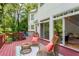 This outdoor deck has comfortable seating and sliding glass doors that fill the interior with natural light at 1169 Dawn View Nw Ln, Atlanta, GA 30327