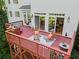 This back deck is ideal for outdoor entertaining with a grill and outdoor seating at 1169 Dawn View Nw Ln, Atlanta, GA 30327