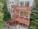 Multi-tiered deck of a home with outdoor seating, perfect for entertaining and enjoying nature at 1169 Dawn View Nw Ln, Atlanta, GA 30327