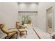 Spacious living room with high ceilings, tile floors, with walkout to porch at 1169 Dawn View Nw Ln, Atlanta, GA 30327