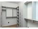 Walk-in closet with custom shelving, drawers, and plenty of storage space at 246 Garland Ave, Decatur, GA 30030