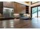 Modern kitchen featuring custom cabinets, a large countertop island, and stainless steel appliances at 246 Garland Ave, Decatur, GA 30030