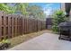 Private backyard with wood fence, patio, and room for outdoor activities at 4150 Cedar Bridge Walk, Suwanee, GA 30024
