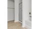 Bathroom featuring tiled floors, soaking tub, and glass shower at 4150 Cedar Bridge Walk, Suwanee, GA 30024