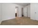 Cozy bedroom with neutral walls and carpet, plus access to a private bathroom at 4150 Cedar Bridge Walk, Suwanee, GA 30024