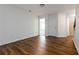 Inviting bedroom with hardwood floors, a ceiling fan, and plenty of natural light at 4150 Cedar Bridge Walk, Suwanee, GA 30024