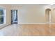 Bright living room features hardwood floors, large windows, and access to the exterior at 4333 Dunwoody Park # 2107, Atlanta, GA 30338