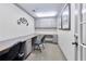 Shared office area with built-in desks, cabinets, carpeting, chairs and neutral color scheme providing a professional workspace at 4333 Dunwoody Park # 2107, Atlanta, GA 30338