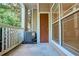 Covered patio with neutral siding and a view of the surrounding greenery at 4333 Dunwoody Park # 2107, Atlanta, GA 30338